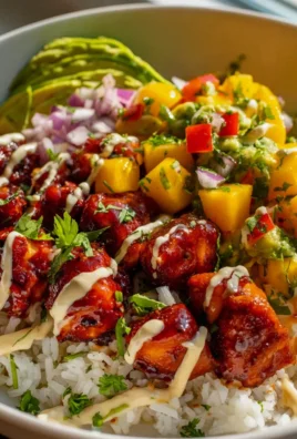 Maple Sriracha Hähnchen mit Kokosreis & Mango-Avocado-Salsa